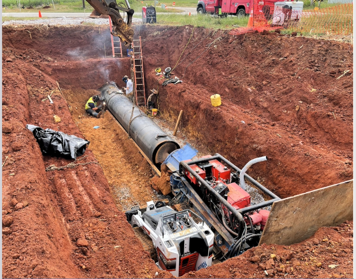 Jack and bore installation in red soil trench